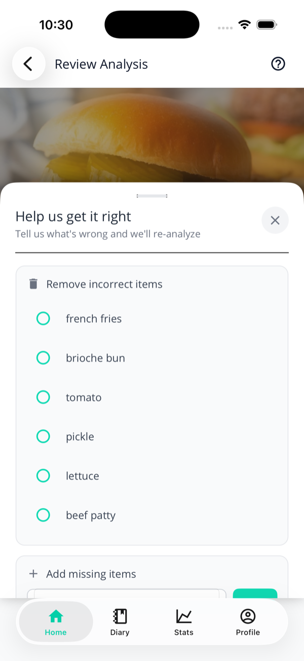 The Help us get it right sheet with a Remove incorrect items section listing french fries, brioche bun, tomato, pickle, lettuce and beef patty as checkboxes.