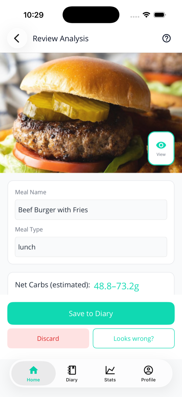 The meal details card showing Net Carbs (estimated): 48.8 to 73.2g for the burger meal.